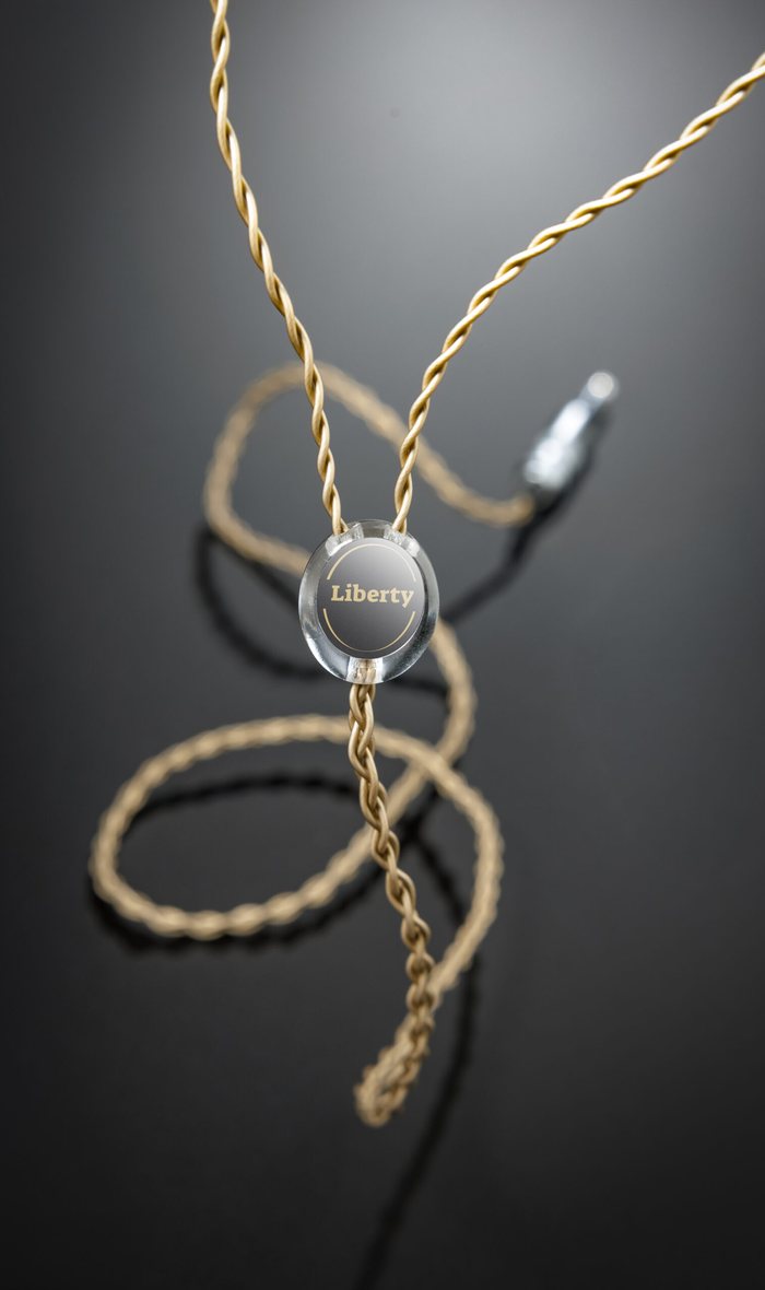 A Liberty headphone cable in gold braid on black