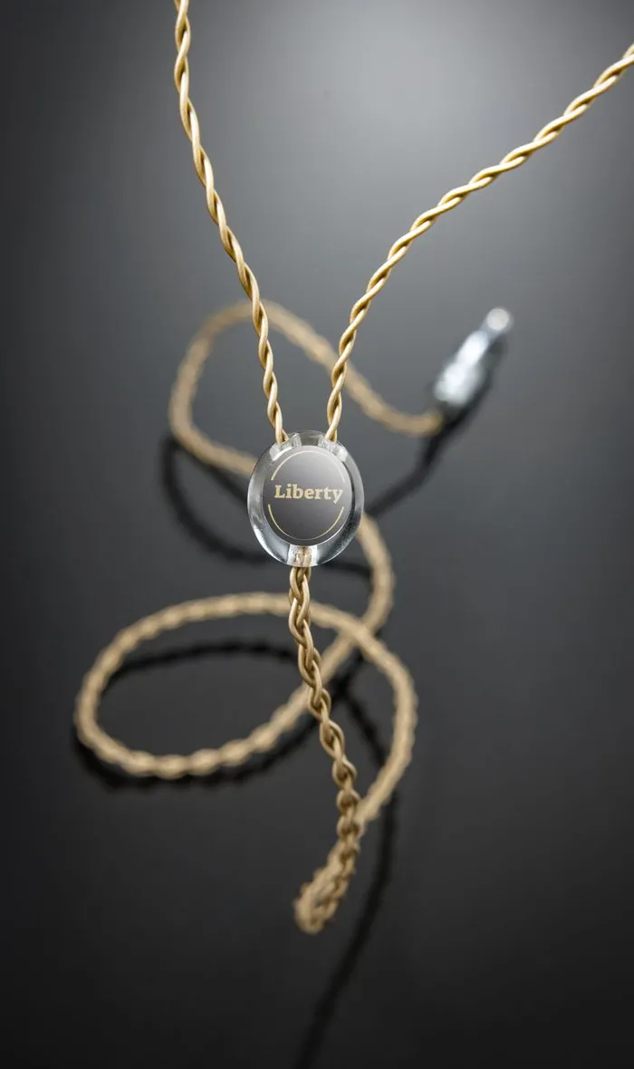 A Liberty headphone cable in gold braid on black