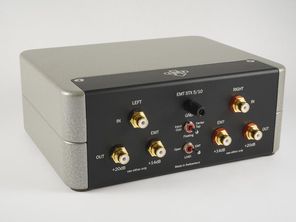 An EMT STX 5/10 step-up transformer in hammered grey, its black back panel of gold and red sockets towards the camera