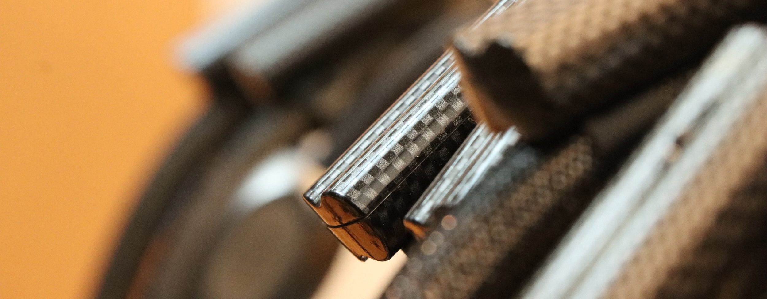 A bundle of finished Esprit cables and their connectors, on the workshop bench