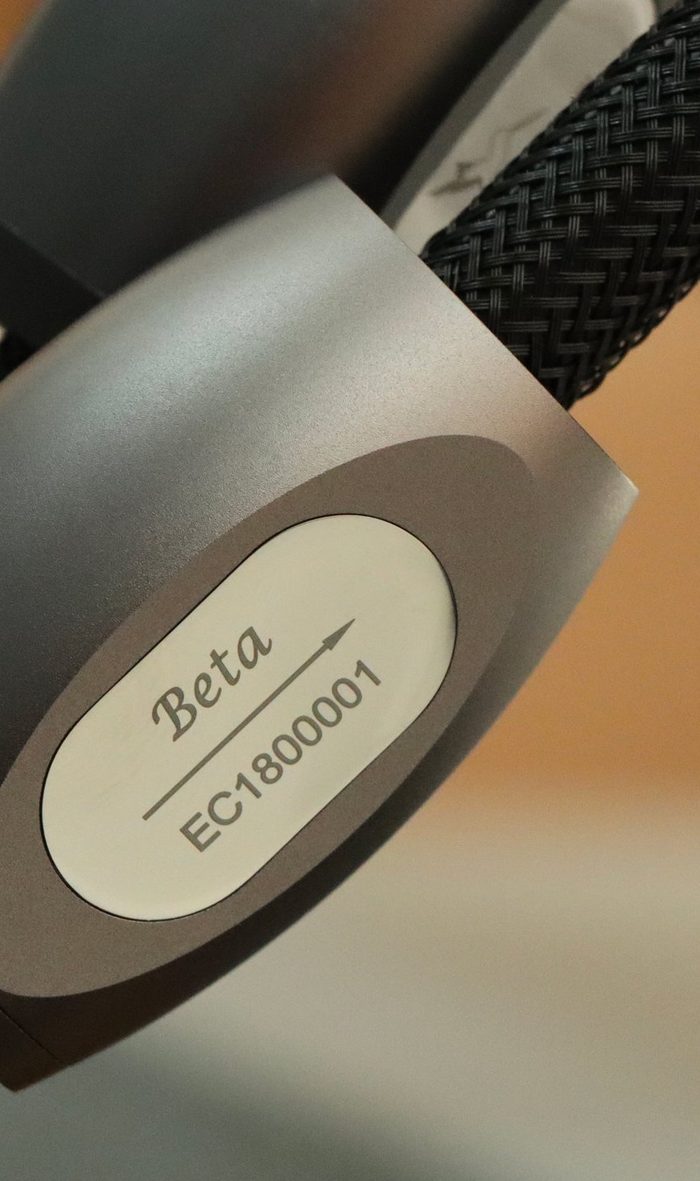 The Beta badge on a black braided cable