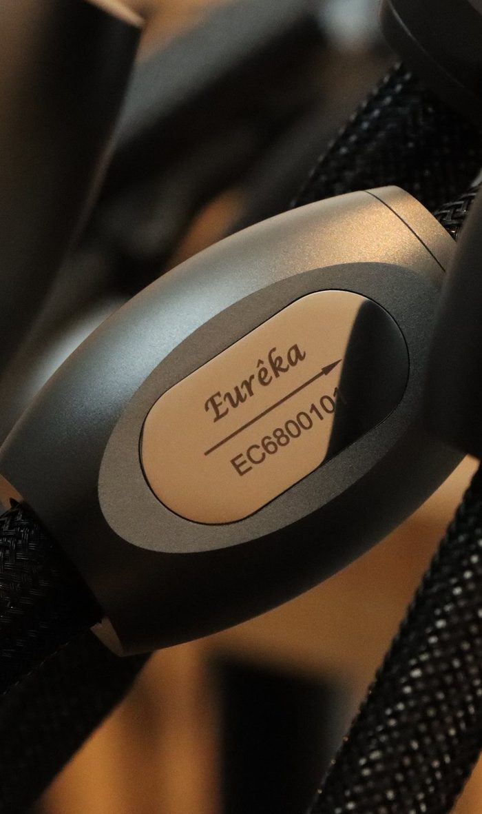 The Eurêka badge on a black braided cable
