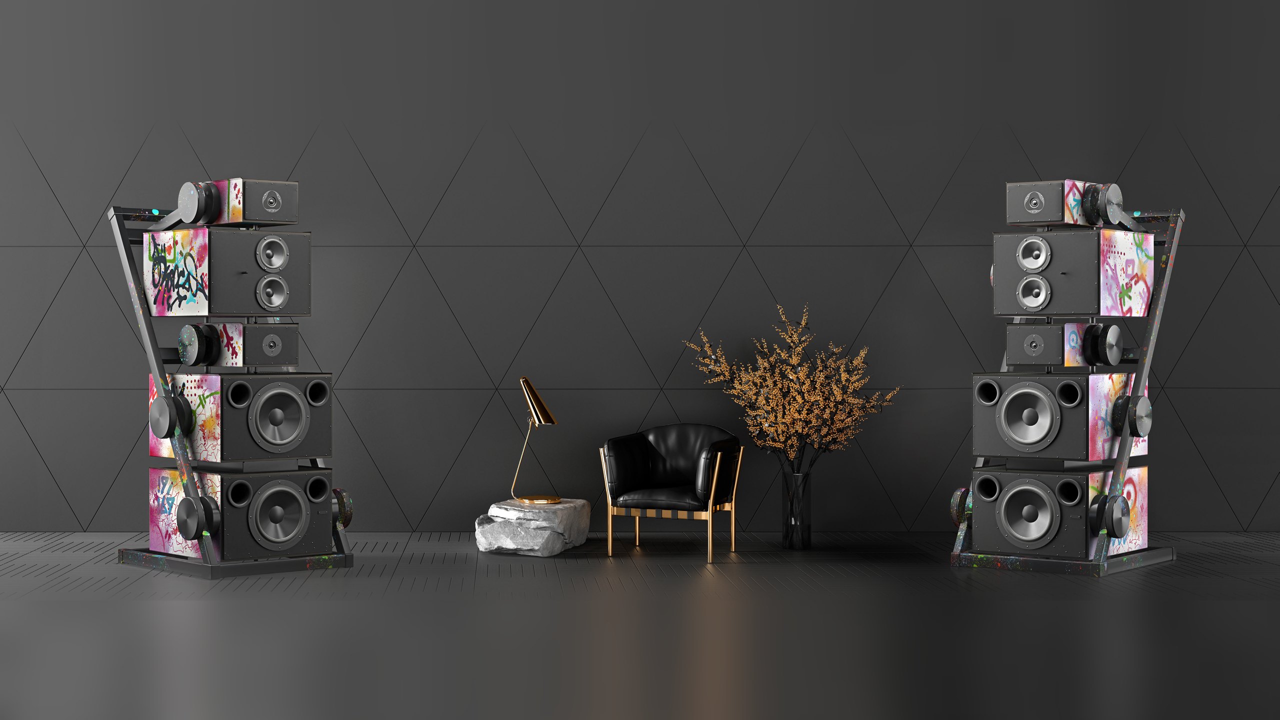 A pair of Apologue loudspeakers in white leather hand-painted with graffiti, either side of a black armchair against a dark panelled wall