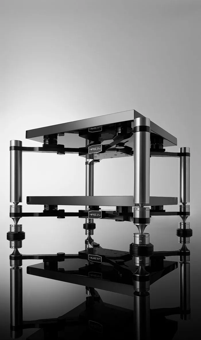 A three-tier Mythology Transform X-Frame rack in black and steel on grey