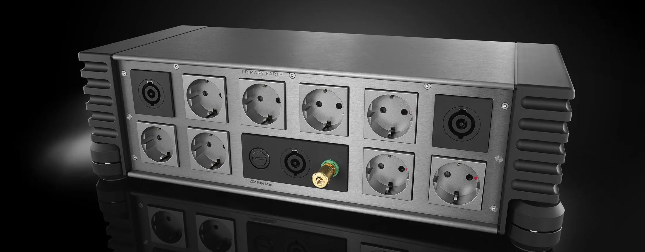 The back of a QBASE Supreme Reference, its mains outlets in two rows