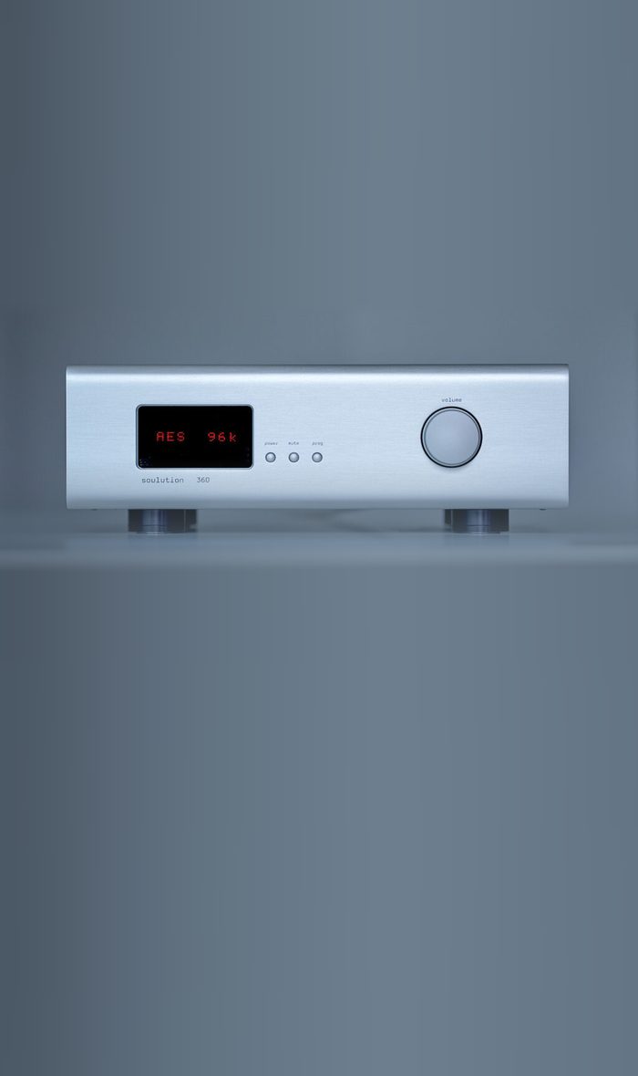 A soulution 360 converter in silver on a grey ground
