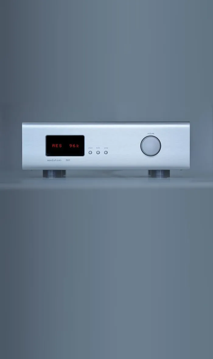 A soulution 360 converter in silver on a grey ground