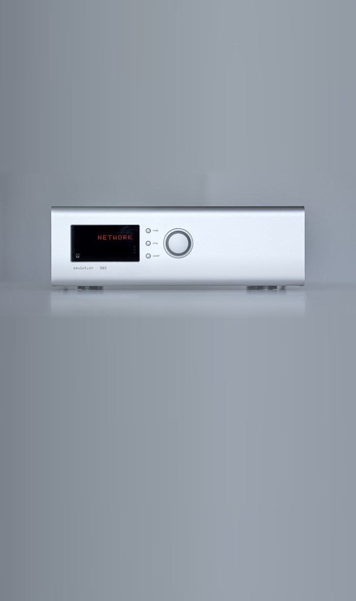 A soulution 560 converter in silver on a grey ground