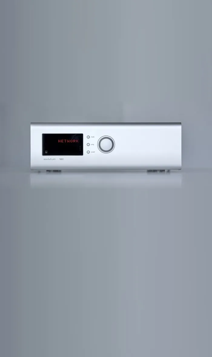 A soulution 560 converter in silver on a grey ground