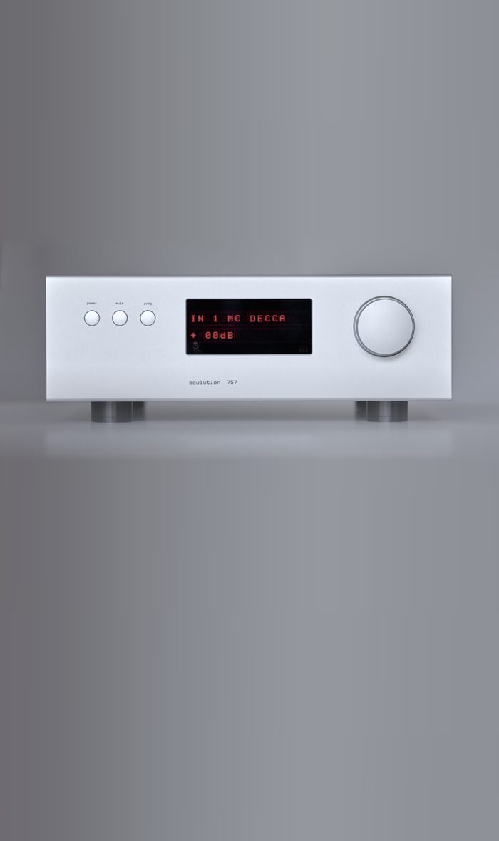 A soulution 757 preamplifier in silver on a grey ground