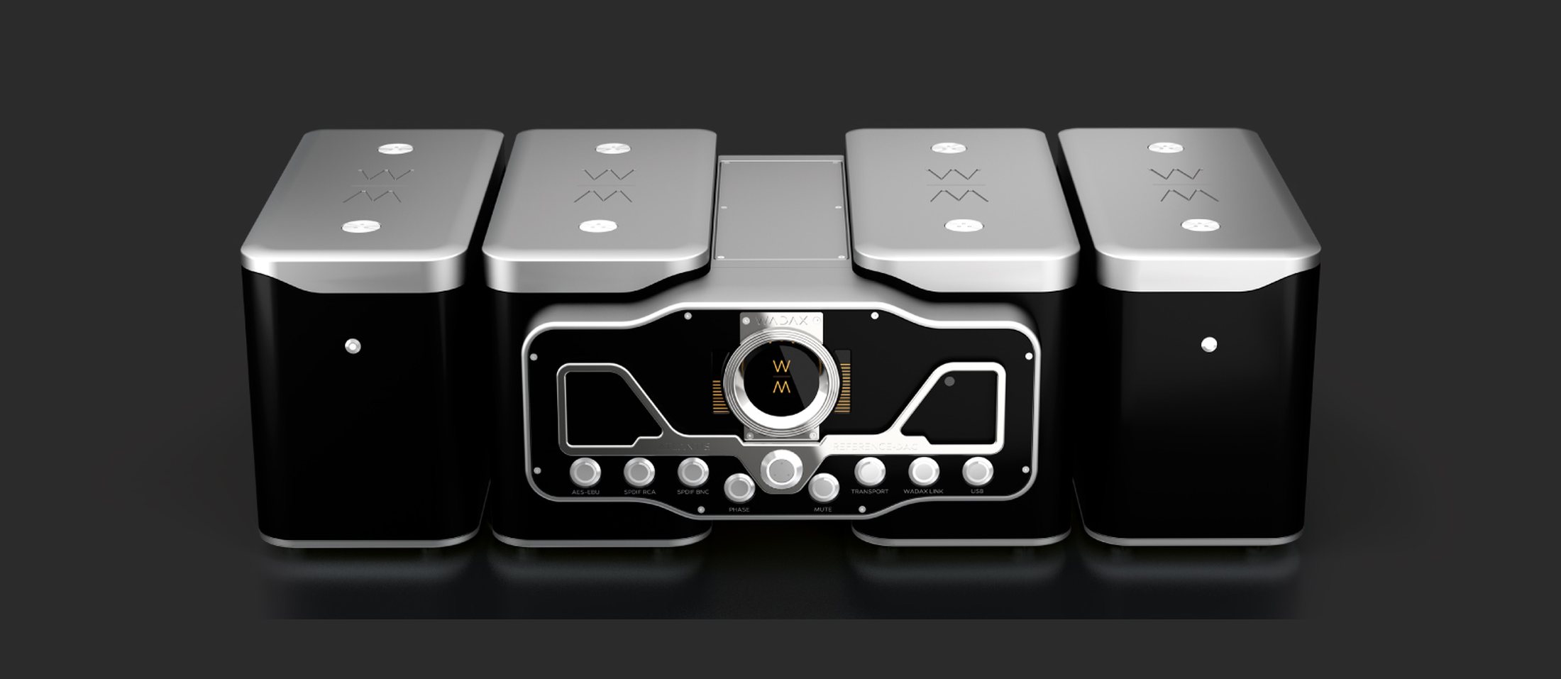 The Wadax Reference system in a row — DAC, transport, server and power supplies — in black and silver on a dark ground
