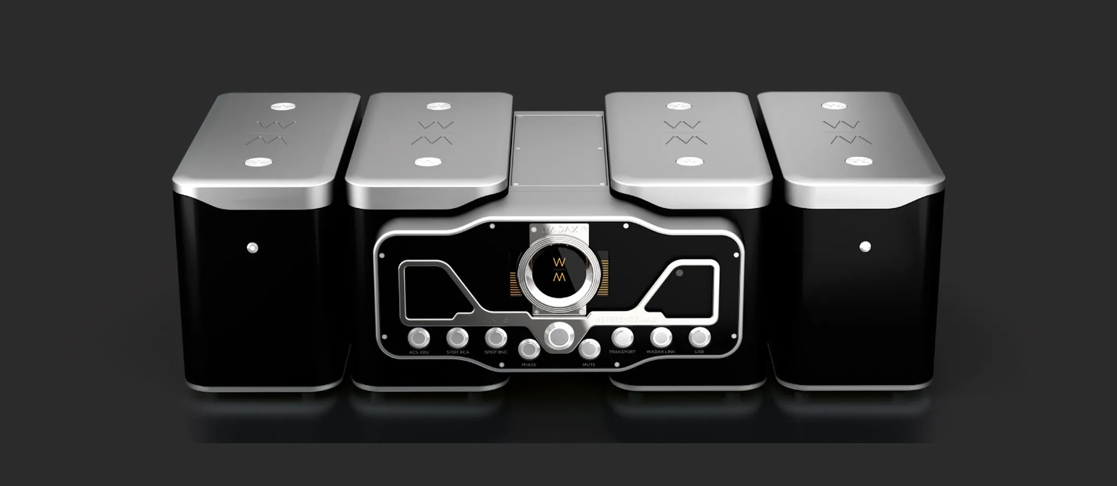 The Wadax Reference system in a row — DAC, transport, server and power supplies — in black and silver on a dark ground