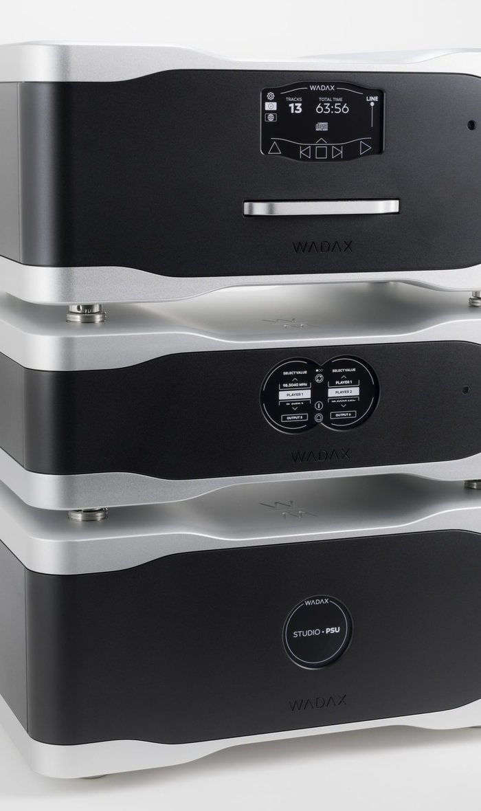 The Studio Player, PSU and Clock stacked, black with silver frames, on white