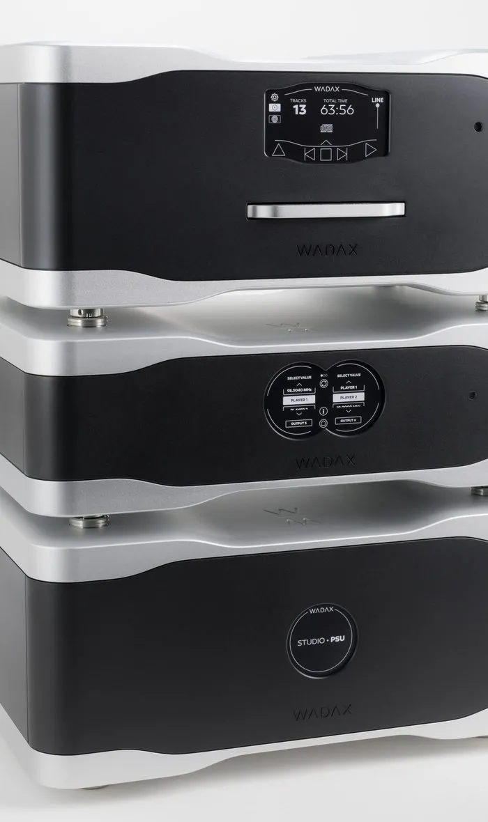 The Studio Player, PSU and Clock stacked, black with silver frames, on white